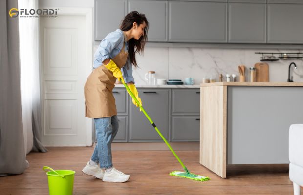 Damp mop with a pH-neutral cleaner designed for vinyl