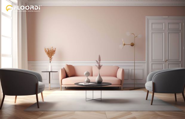 Classic white wainscoting adds traditional charm and balances the tall pink walls in this living room