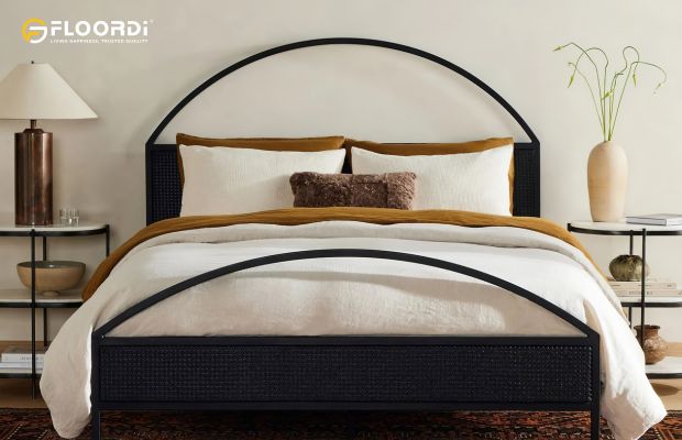 A statement-making metal headboard featuring a high arch and a woven grid design in a modern bedroom