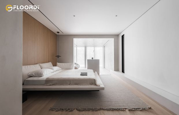 A minimalist bedroom where a seamless wood slat installation serves as an integrated architectural headboard