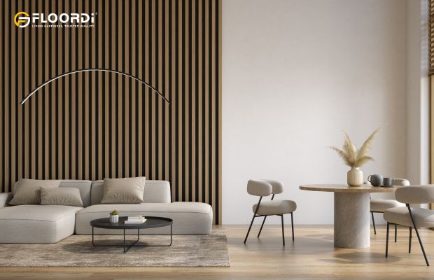 A modern living room featuring a vertical slat wall made of natural oak, showcasing its warmth and unique grain