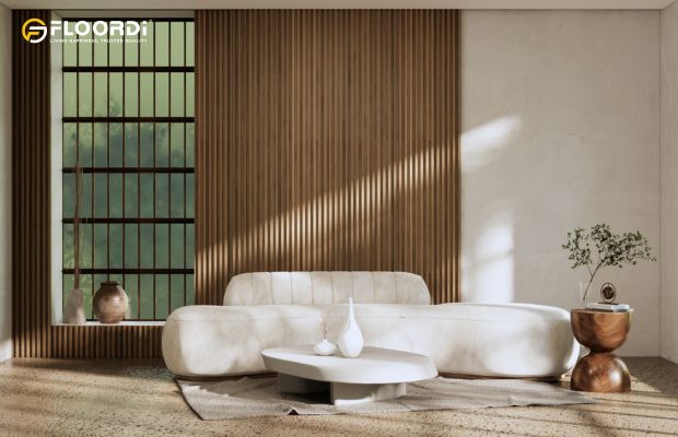 A Japandi-style living room featuring a vertical wood slat accent wall behind the sofa